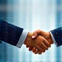 握手をしているビジネスマンの抽象的な画像